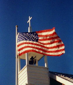 steeple with Cross and USA flag